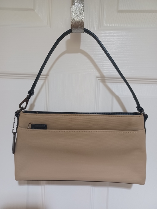 Coach Handbags - Coach Mercer Beige Shoulder Bag with Black Handle
